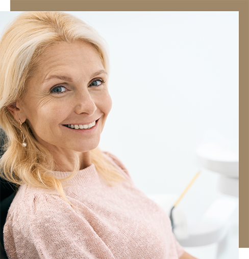 Older blonde woman at her dental appointment