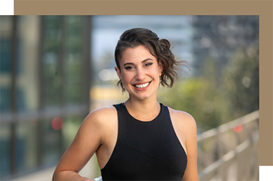 Smiling woman in a black tank top