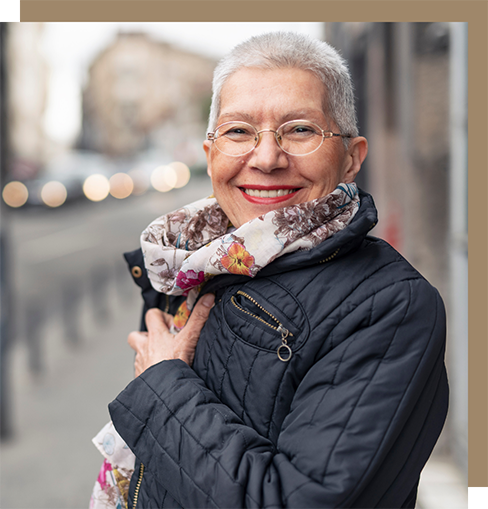 Smiling older woman in a colorful scarf