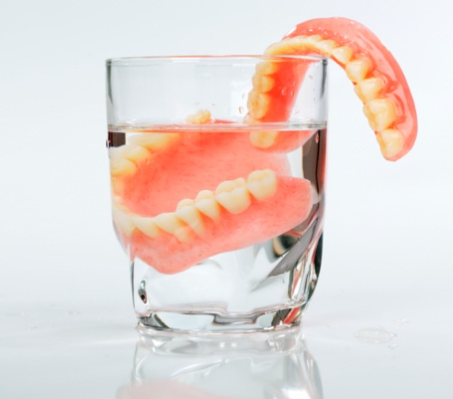 Dentures in a glass of water