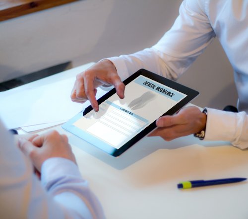 Dental insurance forms on tablet computer