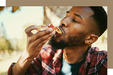 Man eating pizza