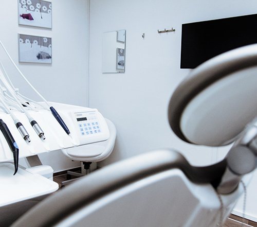 Empty dental chair in modern office