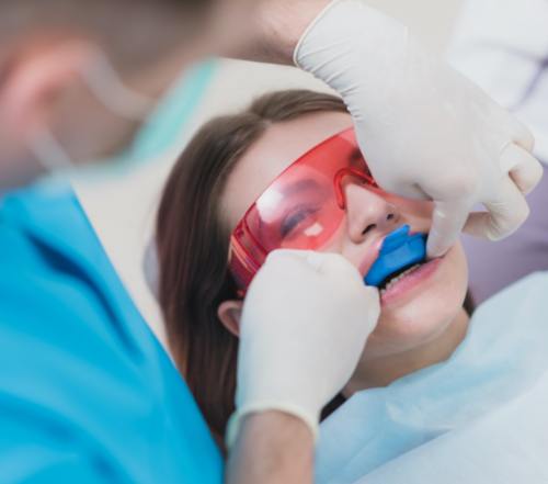 Patient receiving fluoride treatment