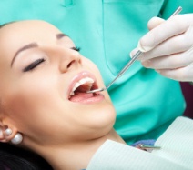 Woman receiving dental checkup