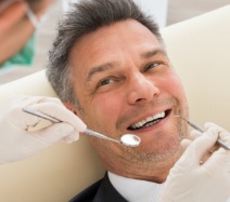 Man receiving dental cleaning