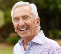 Man smiling after oral cancer screening