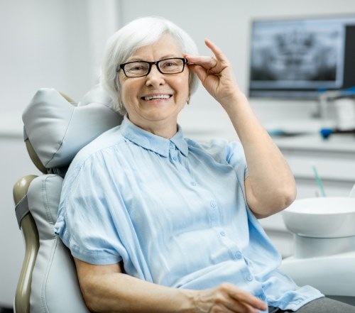 Woman smiling during preventive dentistry checkup and teeth cleaning