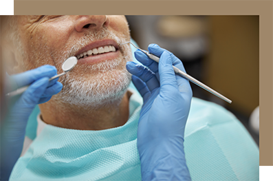 Older man undergoing a dental checkup