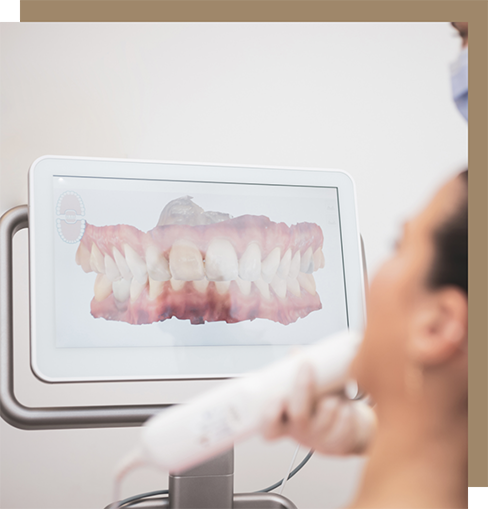 Dentist taking close-up photos of a patient's mouth
