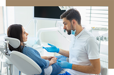 Dentist discussing treatment with a patient