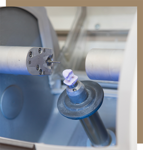 Milling machine creating a dental crown