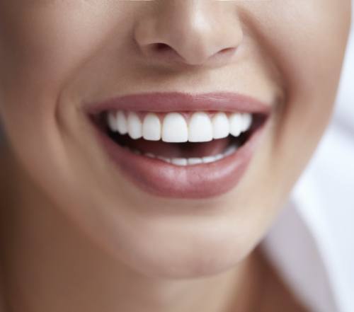 Closeup of healthy smile after scaling and root planing for gum disease