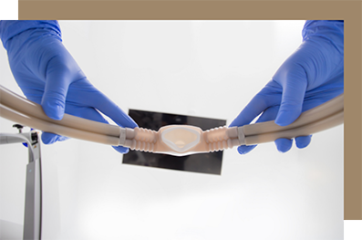 Nitrous oxide mask held in front of the camera