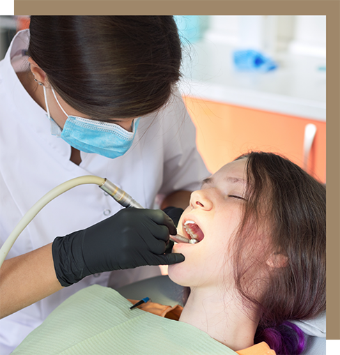Relaxed young woman getting dental work done