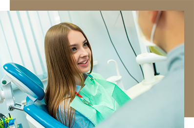 Young woman listening to her dentist