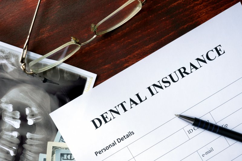 dental insurance form pen glasses