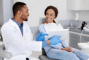 dentist and patient talking