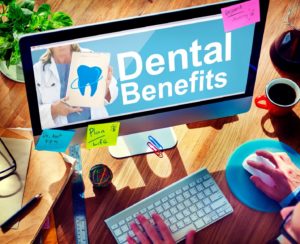 Using computer to learn about dental insurance benefits
