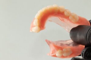 Denture broken in half